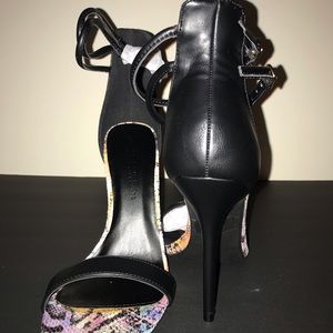 Stiletto approx 4.25” heel, adjustable buckle